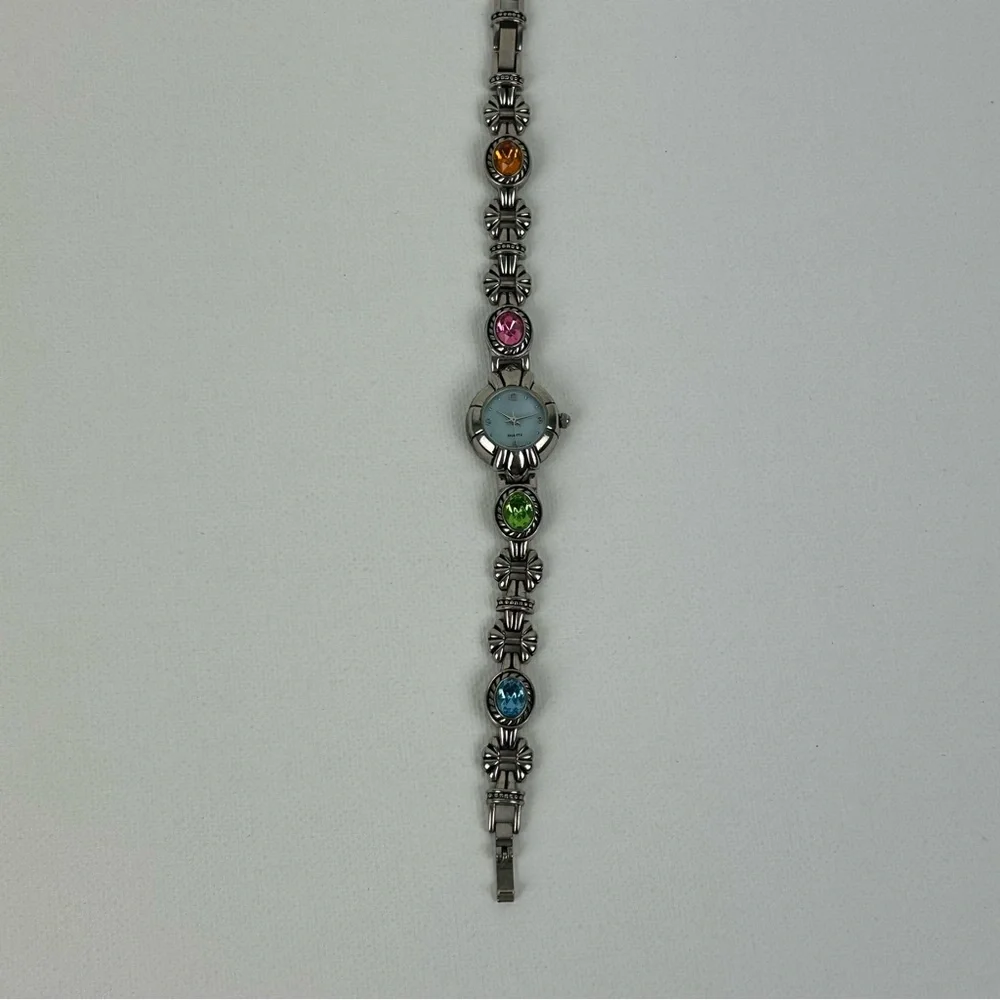 Elegant Silver Tone Quartz watch with Pink, Green, Gold and Blue Accents